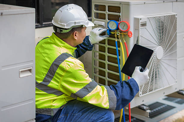Professional Heat Pump Repair technician working in Naples, UT